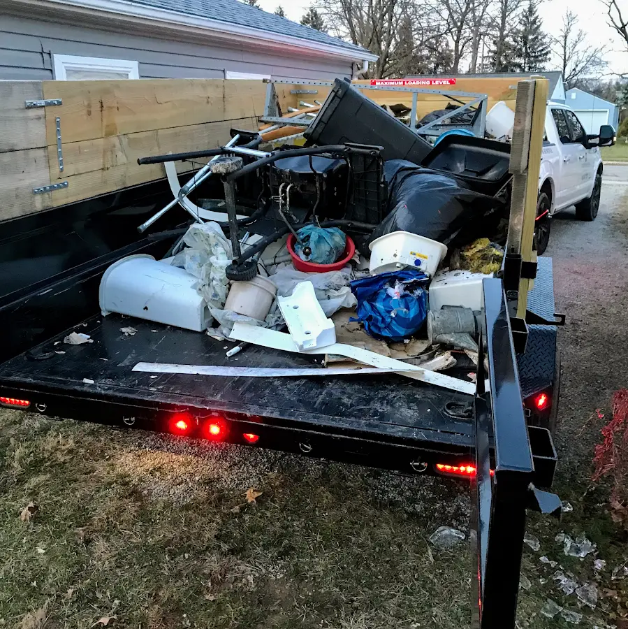 Roll-off dumpster delivered to a residential driveway in Santa Fe